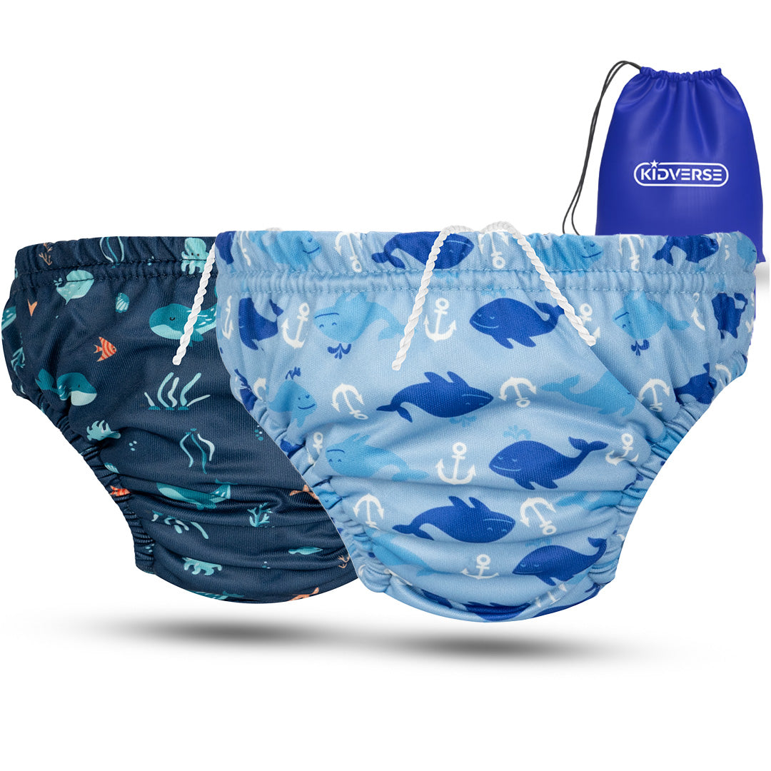 2er Set Wiederverwendbare Baby Schwimmwindel mit Gummibund 0-24 Monate in dunkelblau mit Wal & Unterwasserpflanzen Muster und in hellblau mit Wal & Anker Muster