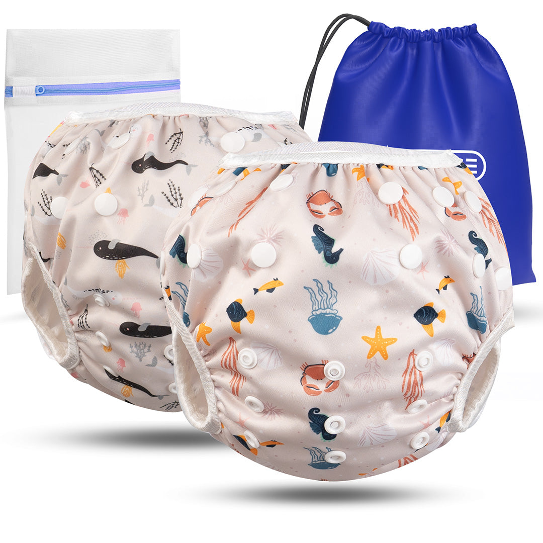2er Set wiederverwendbare Baby Schwimmwindeln mit Druckknöpfen von 0-3 Jahre in beige mit Wal Muster und in beige mit Meerestier Muster