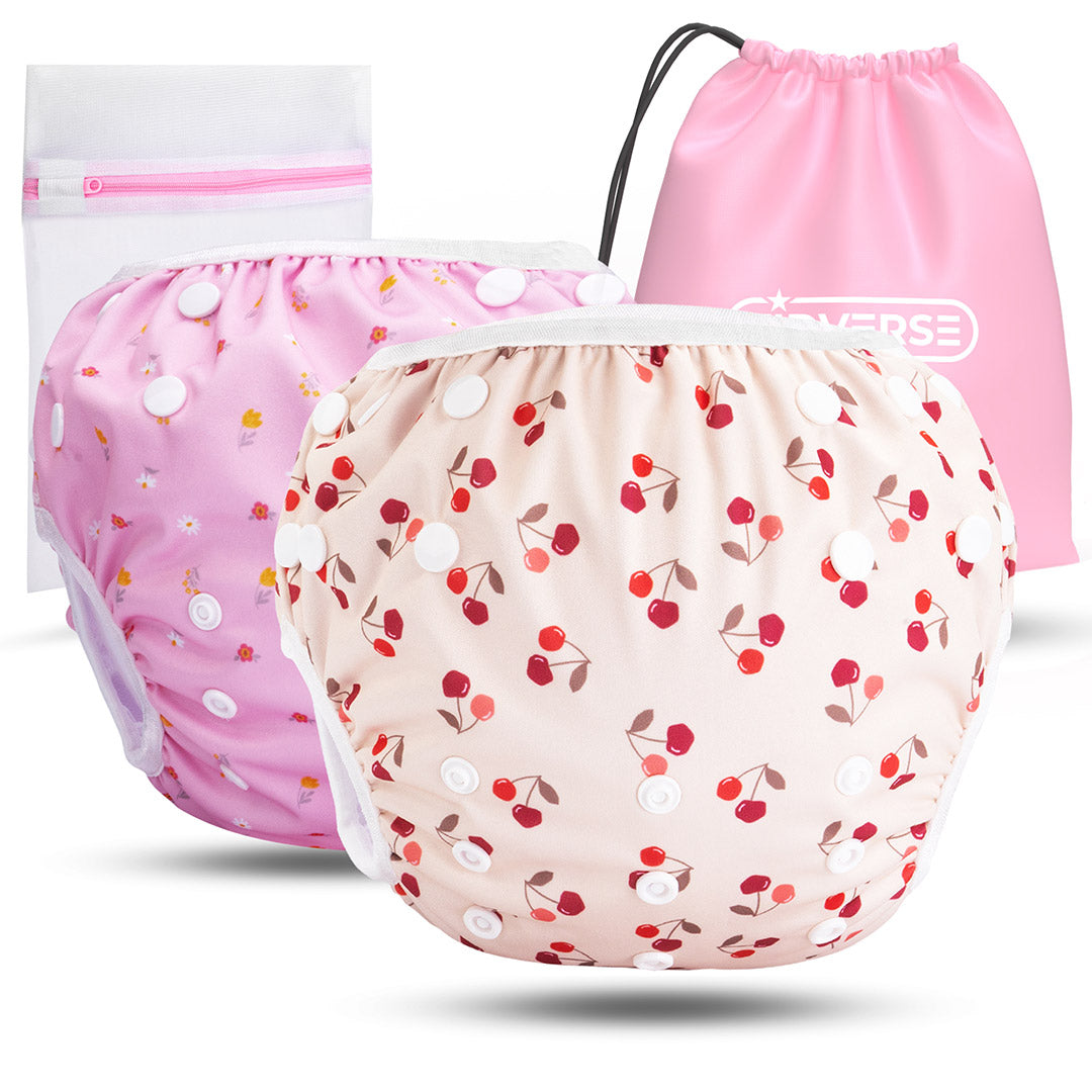 2er Set wiederverwendbare Baby Schwimmwindeln mit Druckknöpfen von 0-3 Jahre in beige mit Kirsch Muster und in hellem Lila mit Blumen Muster