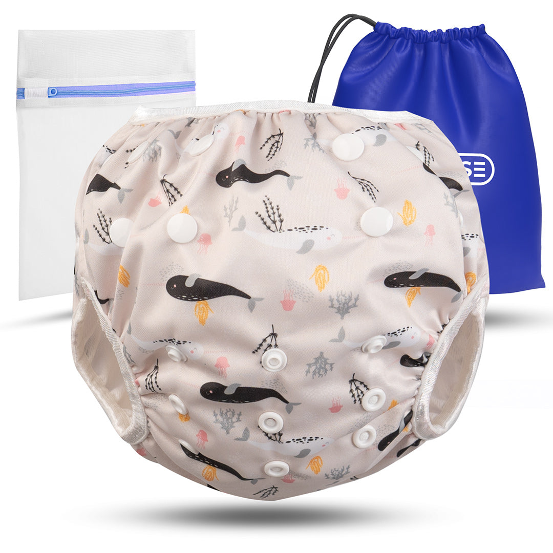 Wiederverwendbare Baby Schwimmwindel mit Druckknöpfen von 0-3 Jahre in beige mit einem Wal Muster