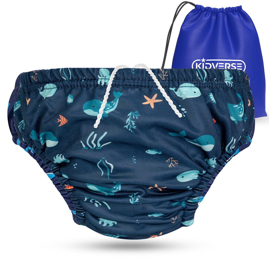Wiederverwendbare Baby Schwimmwindel mit Gummibund 0-24 Monate in dunkelblau mit Wal & Unterwasserpflanzen Muster