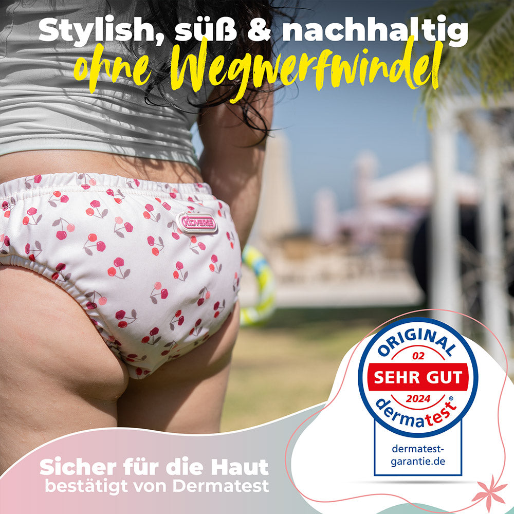 Nahaufnahme der Baby Schwimmwindel mit dem Text Stylisch, süß & nachhaltig ohne Wegwerfwindel. Sicherer für die Haut bestätigt von Dermatest