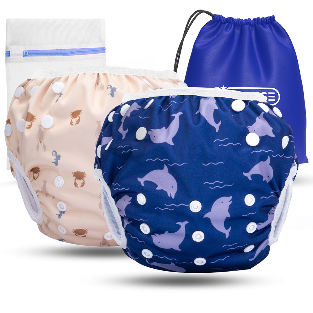2er Set wiederverwendbare Baby Schwimmwindeln mit Druckknöpfen von 0-3 Jahre in beige mit Krabben Muster und in blau mit Delfin Muster