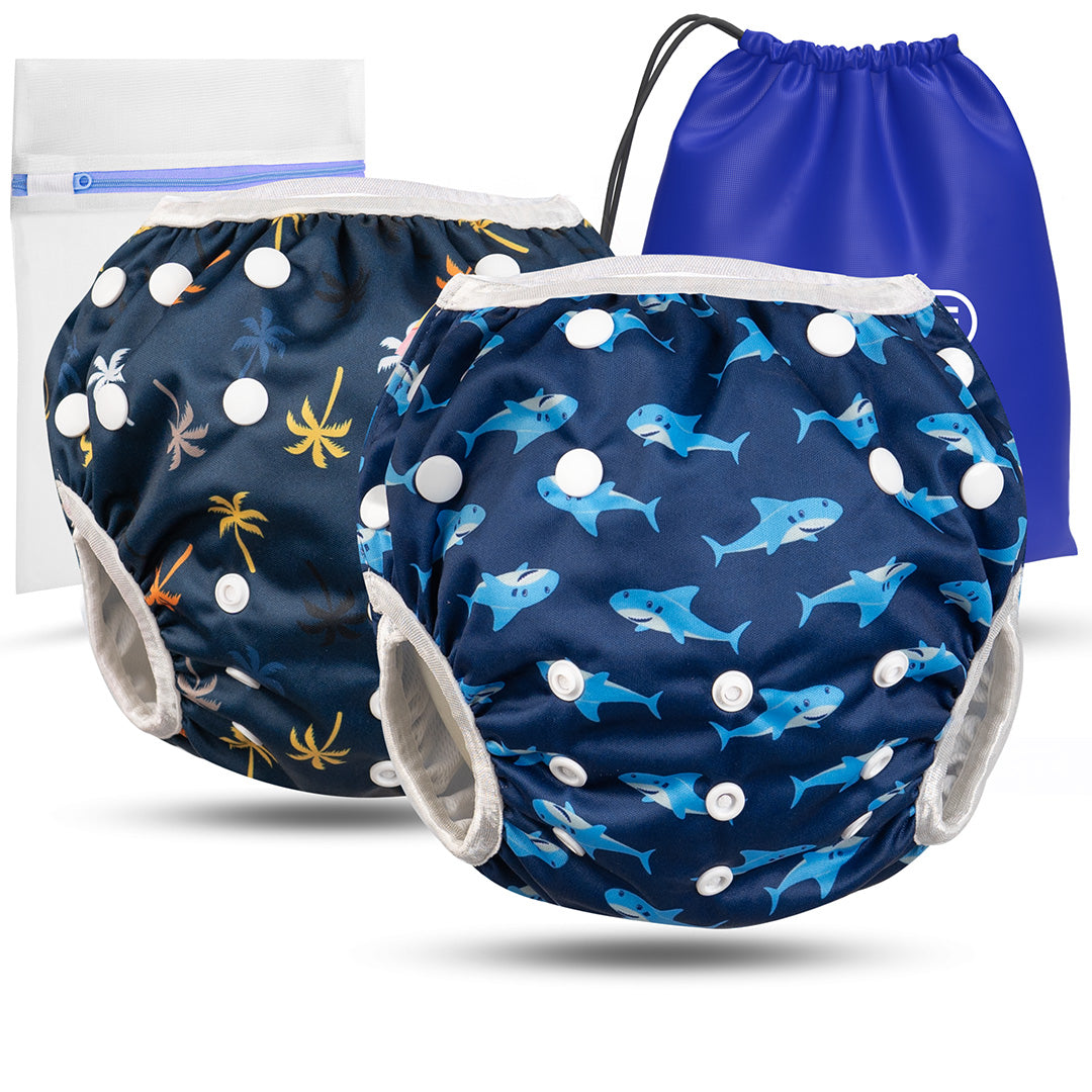 2er Set wiederverwendbare Baby Schwimmwindeln mit Druckknöpfen von 0-3 Jahre in dunkelblau mit Palmen Muster und in blau mit Hai Muster